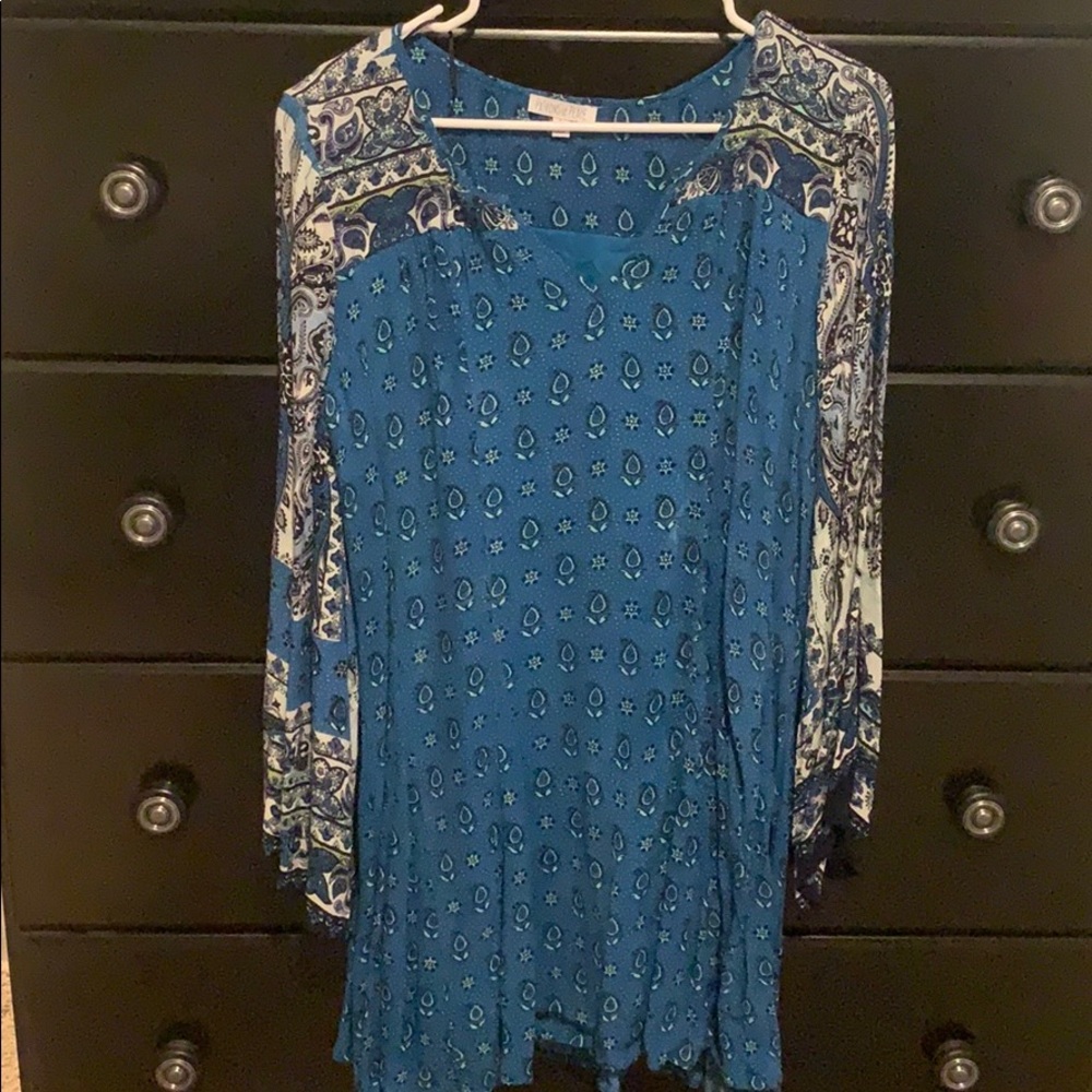 Patrons of peace long sleeve float dress.